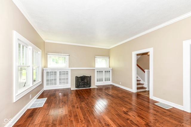 1325 Fordice Rd, Lebanon, IN 46052 - unfurnished living room featuring ornamental molding, hardwood / wood-style floors, stairway, and a fireplace
