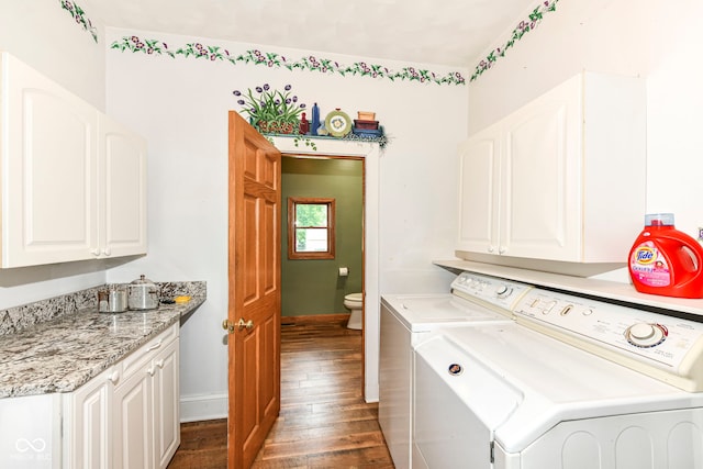 1325 Fordice Rd, Lebanon, IN 46052 - laundry area with washing machine and clothes dryer, wood finished floors, and cabinet space
