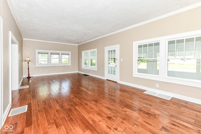 1325 Fordice Rd, Lebanon, IN 46052 - unfurnished living room with hardwood / wood-style floors, a textured ceiling, and ornamental molding