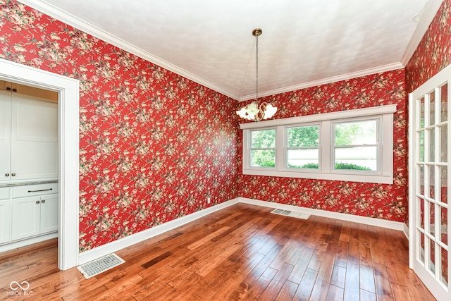 1325 Fordice Rd, Lebanon, IN 46052 - unfurnished dining area with light wood-style flooring, a chandelier, and wallpapered walls