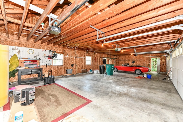 1325 Fordice Rd, Lebanon, IN 46052 - garage featuring a garage door opener and a workshop area