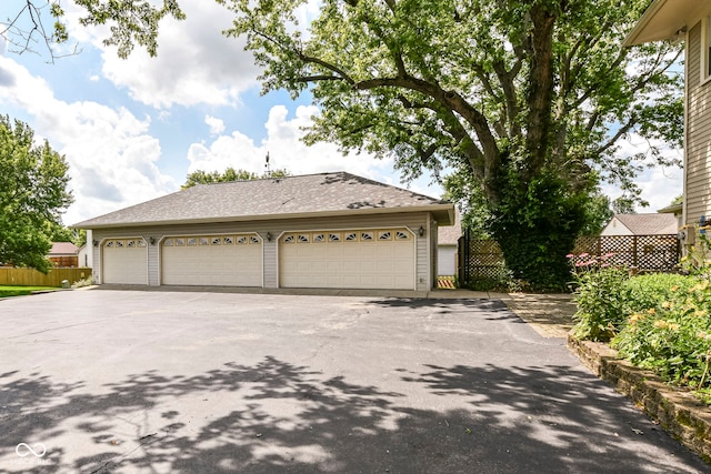 1325 Fordice Rd, Lebanon, IN 46052 - view of front of home featuring a garage and roof with shingles