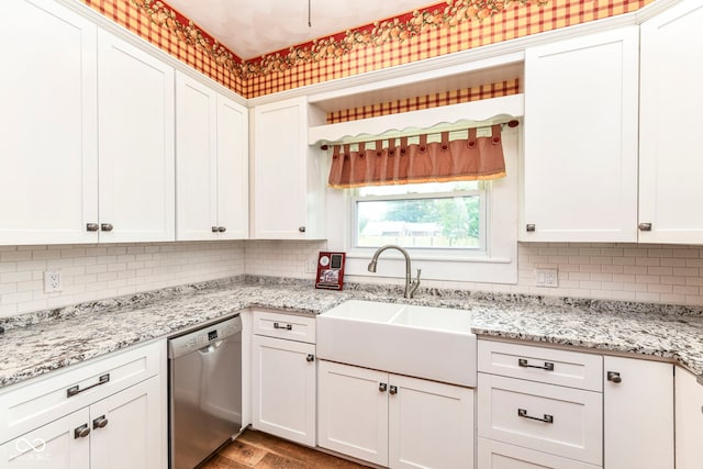 1325 Fordice Rd, Lebanon, IN 46052 - kitchen with stainless steel dishwasher, white cabinetry, and decorative backsplash