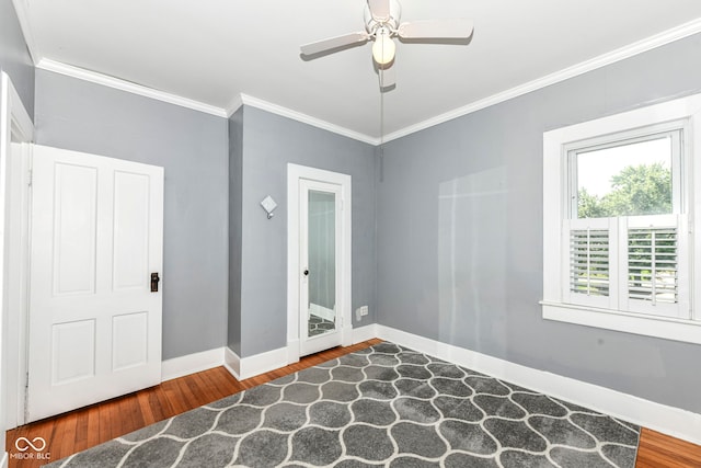 1325 Fordice Rd, Lebanon, IN 46052 - spare room featuring wood finished floors, ornamental molding, and a ceiling fan