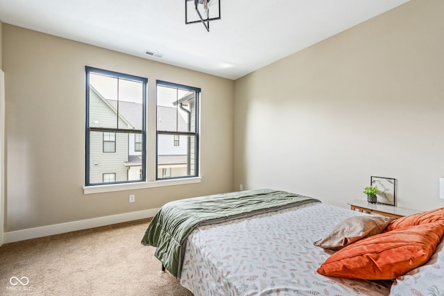 830 Freeland Way, Carmel, IN 46032 - carpeted bedroom featuring baseboards