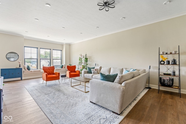 830 Freeland Way, Carmel, IN 46032 - living area featuring wood finished floors and crown molding
