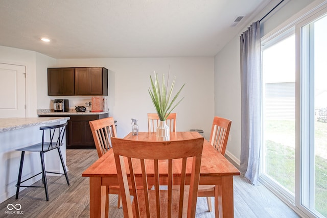 507 Redvine Dr, Sheridan, IN 46069 - dining area with light wood-style floors and recessed lighting