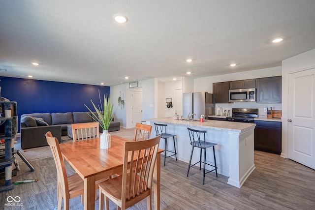 507 Redvine Dr, Sheridan, IN 46069 - dining room featuring light wood-type flooring and recessed lighting