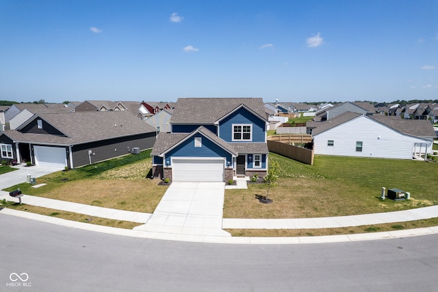 507 Redvine Dr, Sheridan, IN 46069 - view of front of property with a residential view, concrete driveway, an attached garage, and a shingled roof