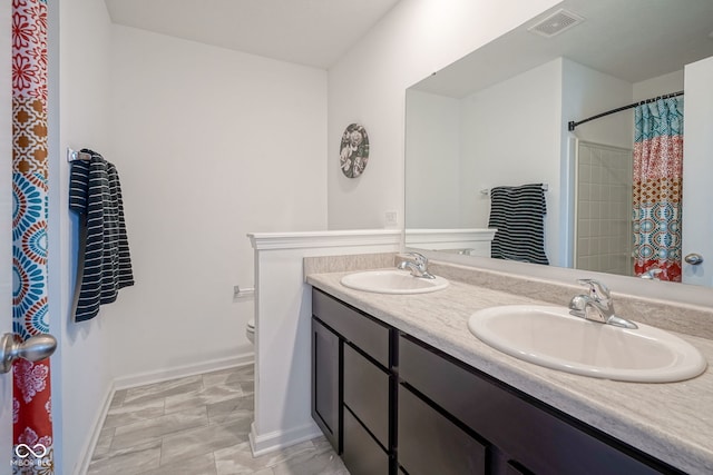507 Redvine Dr, Sheridan, IN 46069 - bathroom featuring double vanity and a shower with shower curtain