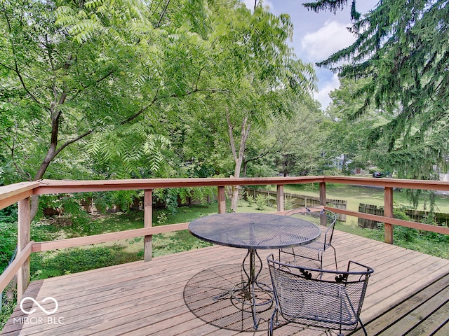 1908 W Northgate St, Indianapolis, IN 46228 - wooden deck with outdoor dining space