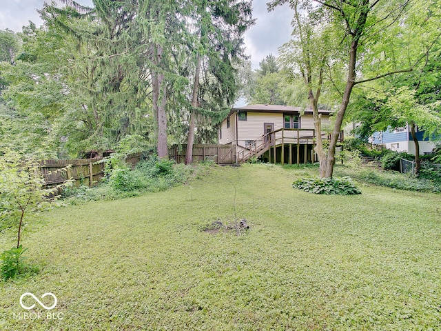 1908 W Northgate St, Indianapolis, IN 46228 - view of yard featuring a wooden deck and stairs