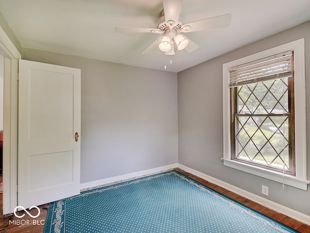 1908 W Northgate St, Indianapolis, IN 46228 - empty room featuring a ceiling fan and wood finished floors