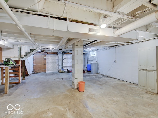 1908 W Northgate St, Indianapolis, IN 46228 - unfinished basement with stairs and a water softener