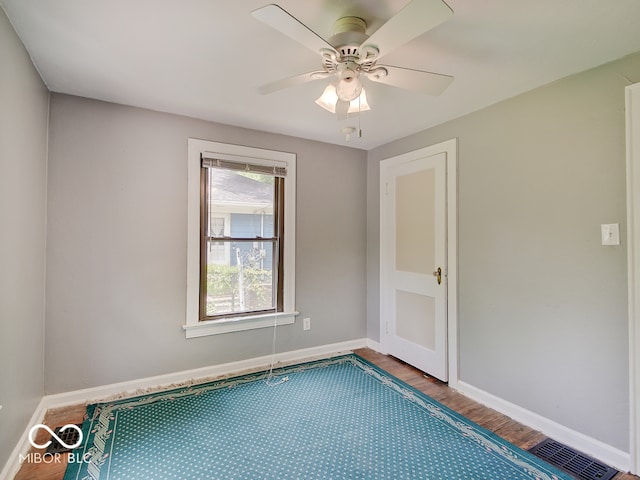 1908 W Northgate St, Indianapolis, IN 46228 - unfurnished room with wood finished floors and a ceiling fan