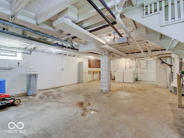 1908 W Northgate St, Indianapolis, IN 46228 - below grade area featuring a water softener system and washer and clothes dryer