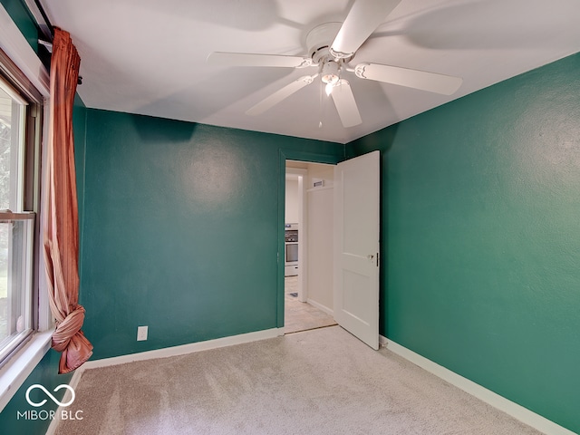 1908 W Northgate St, Indianapolis, IN 46228 - unfurnished room featuring a ceiling fan and carpet floors