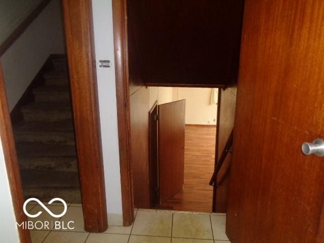 3253 W 34th St, Indianapolis, IN 46222 - staircase with tile patterned flooring