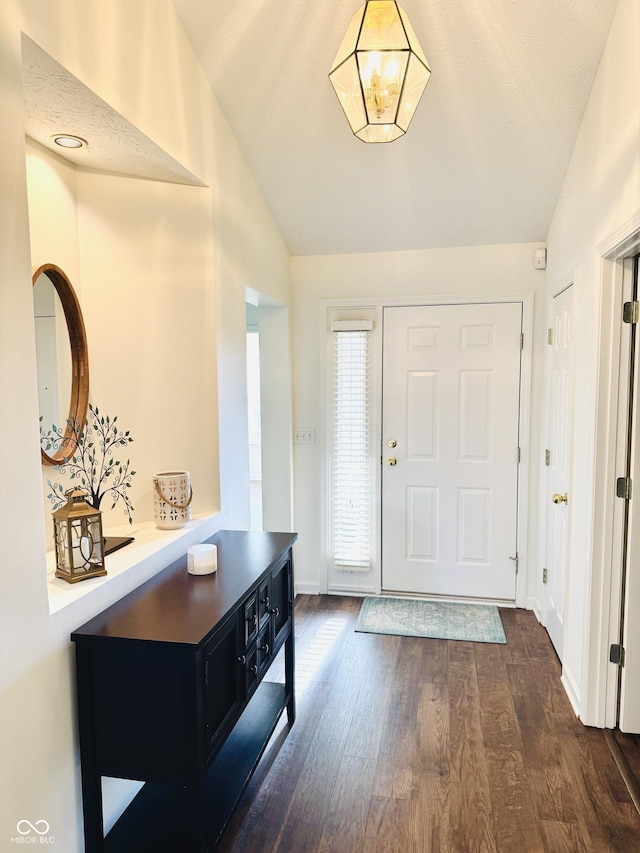 10477 Silver Ridge Cir, Fishers, IN 46038 - foyer with vaulted ceiling and dark wood finished floors