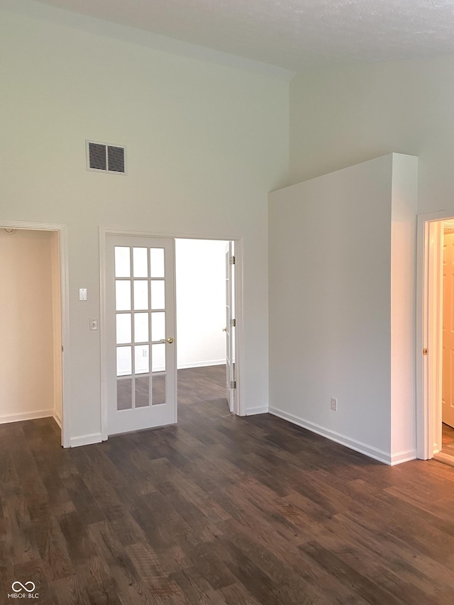 10477 Silver Ridge Cir, Fishers, IN 46038 - unfurnished room with high vaulted ceiling and dark wood finished floors