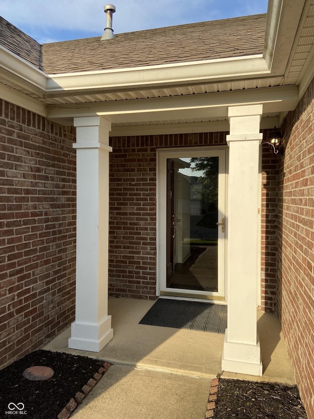 10477 Silver Ridge Cir, Fishers, IN 46038 - property entrance with brick siding and a shingled roof