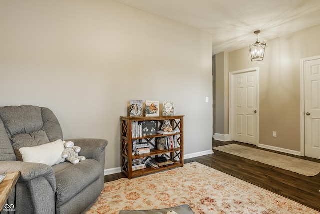17183 Petersfield Ln, Westfield, IN 46074 - sitting room with a chandelier and wood finished floors