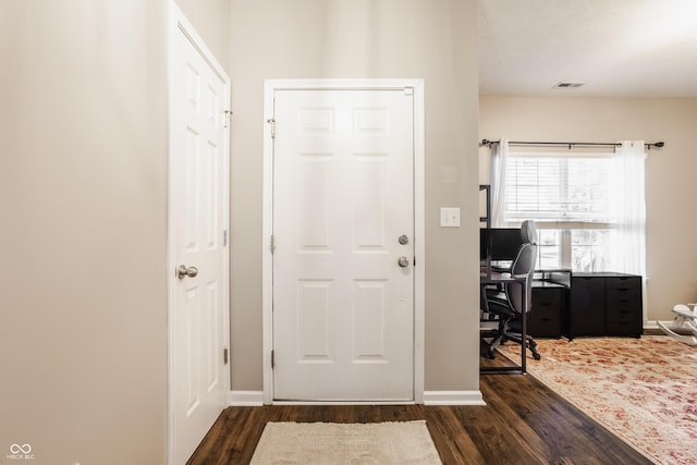 17183 Petersfield Ln, Westfield, IN 46074 - foyer with dark wood-type flooring and baseboards
