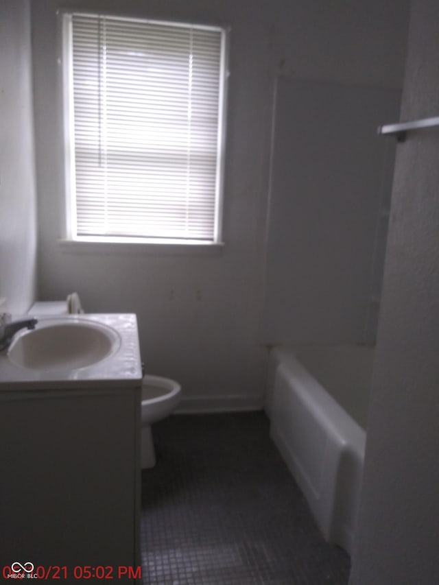 2138 Admiral Dr, Indianapolis, IN 46219 - full bathroom with vanity and tile patterned flooring