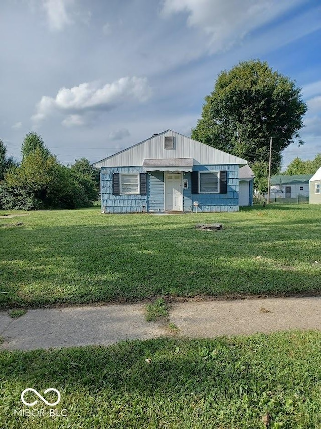 2138 Admiral Dr, Indianapolis, IN 46219 - view of front of home featuring a front yard