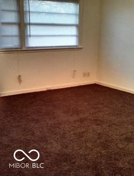 2138 Admiral Dr, Indianapolis, IN 46219 - unfurnished room featuring carpet floors and baseboards
