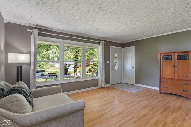 1302 N Furman Ave, Indianapolis, IN 46214 - living area featuring crown molding, light wood-type flooring, and a textured ceiling
