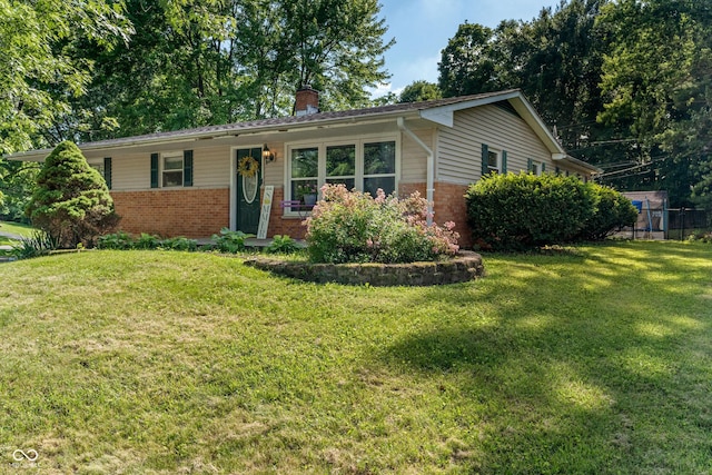 1302 N Furman Ave, Indianapolis, IN 46214 - ranch-style house with brick siding and a chimney