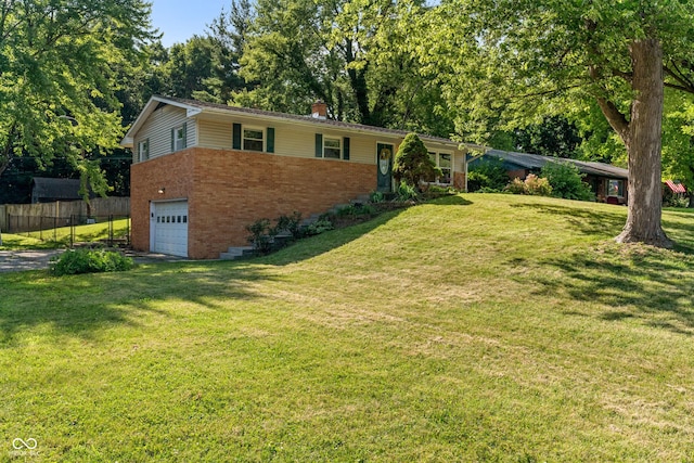 1302 N Furman Ave, Indianapolis, IN 46214 - view of front facade with brick siding, a garage, a chimney, and driveway
