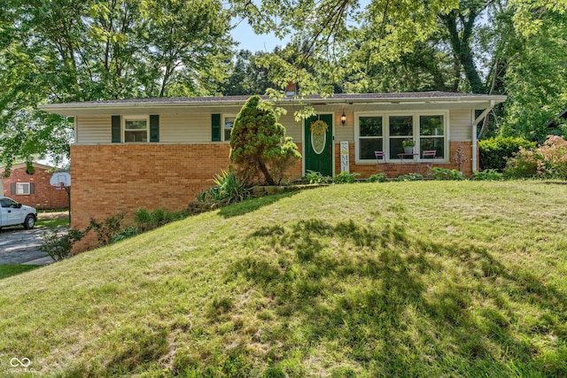 1302 N Furman Ave, Indianapolis, IN 46214 - single story home with brick siding and a front yard