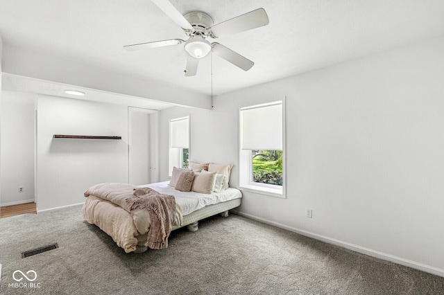 777 Sycamore St, Westfield, IN 46074 - carpeted bedroom with baseboards and a ceiling fan