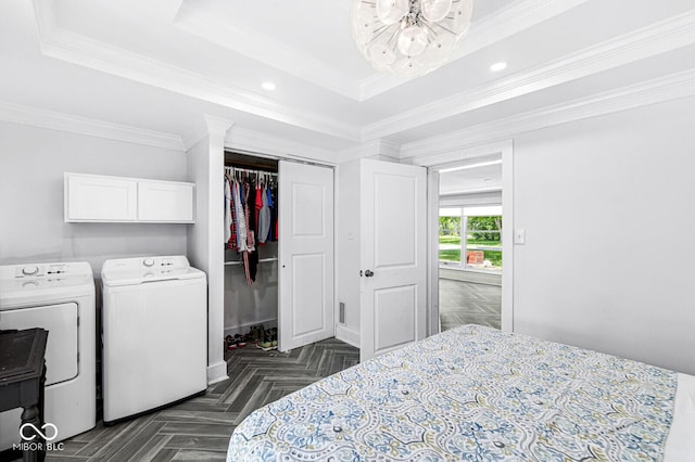 777 Sycamore St, Westfield, IN 46074 - bedroom featuring independent washer and dryer, a tray ceiling, a chandelier, recessed lighting, and crown molding