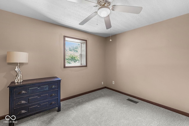 777 Sycamore St, Westfield, IN 46074 - unfurnished bedroom featuring carpet floors, ceiling fan, and a textured ceiling