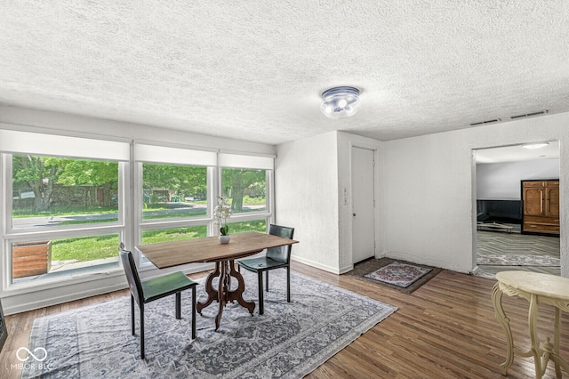 777 Sycamore St, Westfield, IN 46074 - dining room with wood finished floors and a textured ceiling