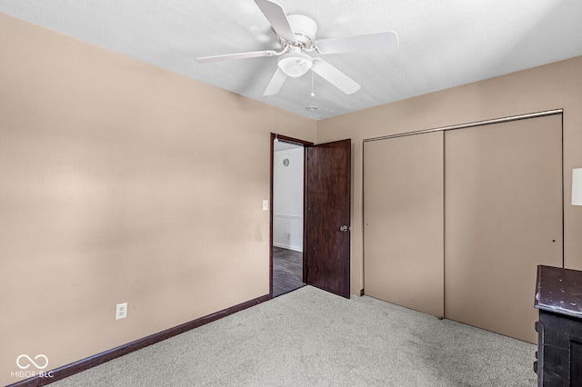 777 Sycamore St, Westfield, IN 46074 - unfurnished bedroom with carpet, a closet, and ceiling fan