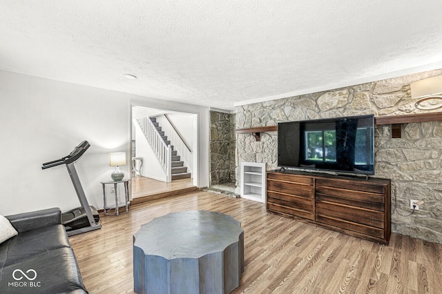 777 Sycamore St, Westfield, IN 46074 - living room with stairway, a textured ceiling, and wood finished floors