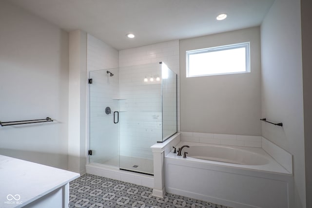 16235 Natures Way, Westfield, IN 46074 - full bath with a garden tub, a stall shower, vanity, and recessed lighting