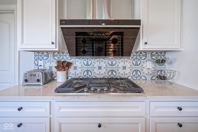 16235 Natures Way, Westfield, IN 46074 - kitchen featuring stainless steel gas stovetop, white cabinets, tasteful backsplash, and light stone countertops