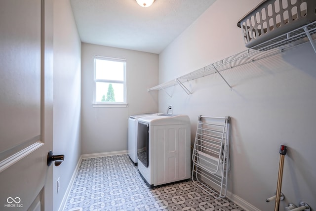 16235 Natures Way, Westfield, IN 46074 - washroom with washing machine and clothes dryer and light flooring