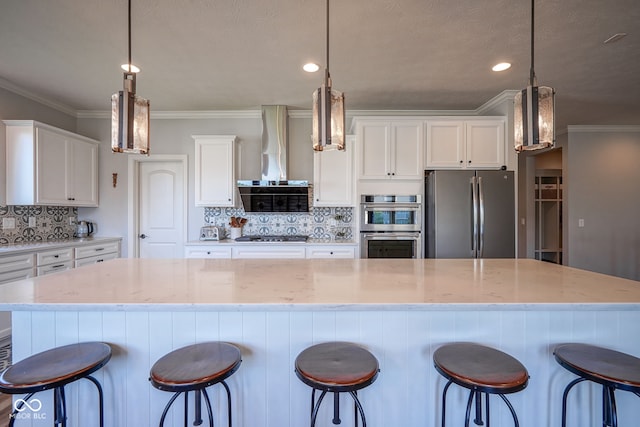 16235 Natures Way, Westfield, IN 46074 - kitchen featuring stainless steel appliances, ornamental molding, decorative backsplash, wall chimney exhaust hood, and white cabinetry