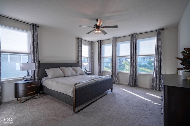 16235 Natures Way, Westfield, IN 46074 - bedroom with multiple windows, light colored carpet, and a ceiling fan