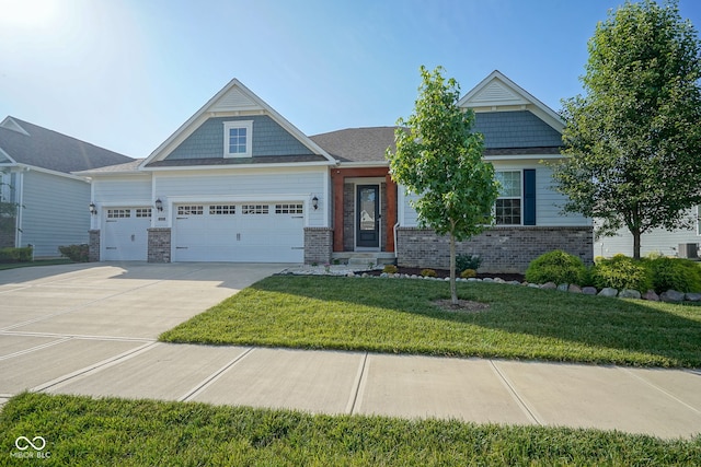 16235 Natures Way, Westfield, IN 46074 - craftsman-style house with an attached garage, brick siding, a front lawn, and concrete driveway