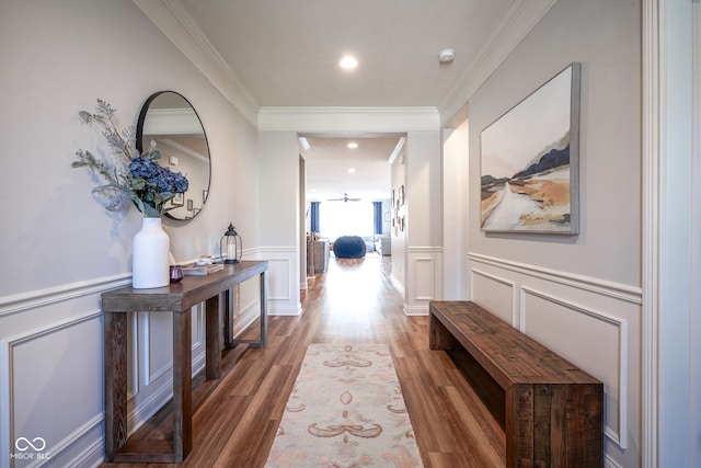 16235 Natures Way, Westfield, IN 46074 - hallway featuring a decorative wall, wood finished floors, crown molding, recessed lighting, and wainscoting