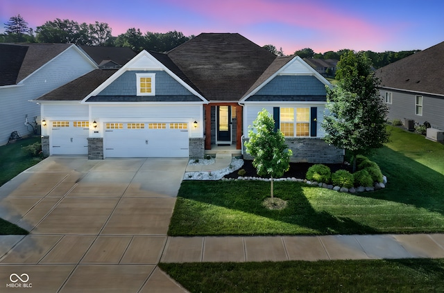 16235 Natures Way, Westfield, IN 46074 - craftsman inspired home featuring an attached garage, driveway, and a front lawn