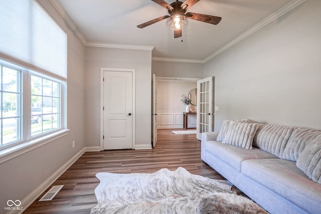 16235 Natures Way, Westfield, IN 46074 - living area featuring crown molding, wood finished floors, ceiling fan, and french doors
