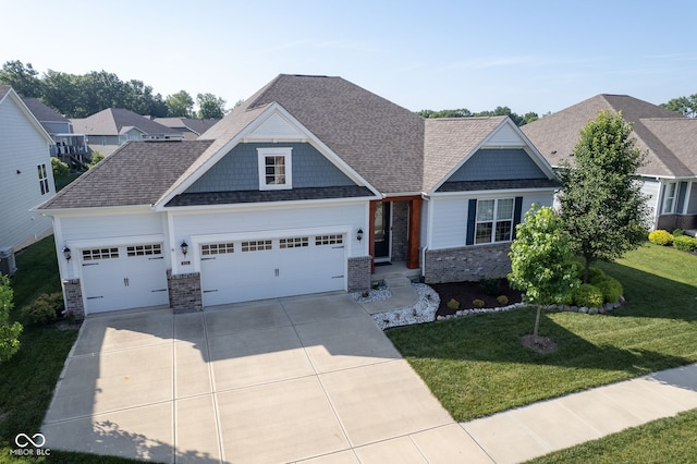 16235 Natures Way, Westfield, IN 46074 - craftsman inspired home featuring a garage, brick siding, concrete driveway, a front lawn, and a shingled roof